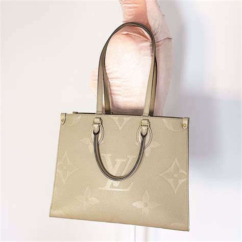 louis vuitton onthego mm monogram empreinte turtledove cream giant bag|louis vuitton onthego handbags.